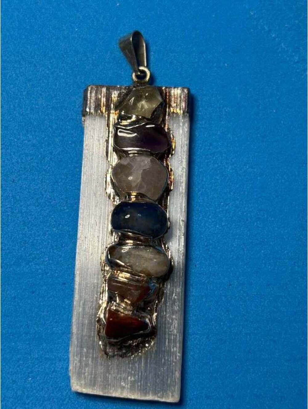 Selenite Chakra Stone Pendant Forest the stones glow